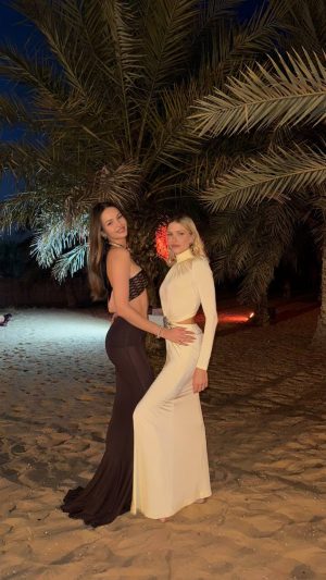 Lena Perminova and Katya enjoying each other’s company, laughing together, and showcasing their close friendship.