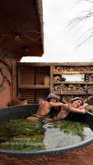 lena perminova poses in a swimsuit at the sauna