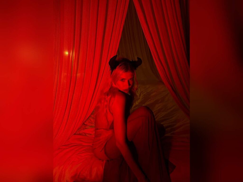 Lena Perminova Goes Viral on Instagram with Her Bold “Kiss Me or Run” Halloween Look 4 lena perminova turns heads on instagram with her “kiss me or run” halloween post 💋🎃