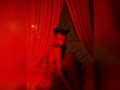 lena perminova turns heads on instagram with her “kiss me or run” halloween post 💋🎃