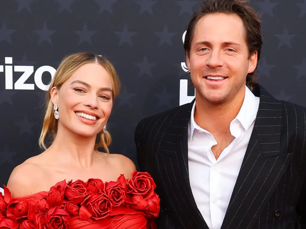 margot robbie officially takes tom ackerley’s surname in the uk